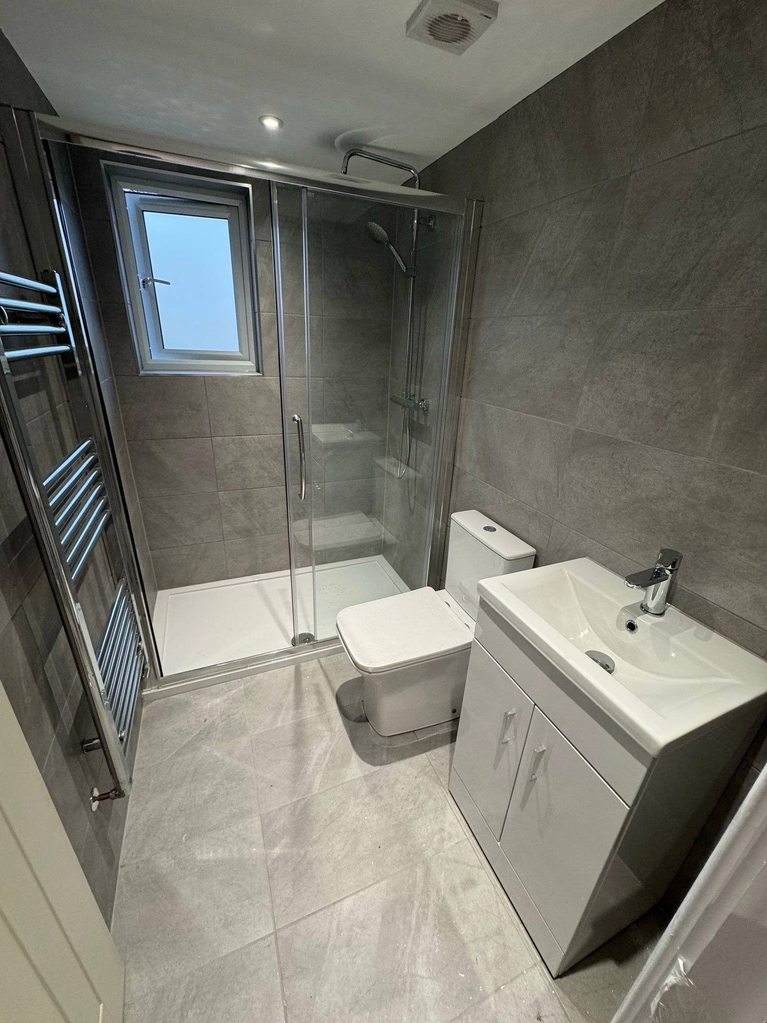 home-renovated-bathroom-shower-loft-conversion-surrey