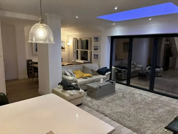 Harpers Home Developments 8 kitchen relocation with grey cabinets and open-plan living space