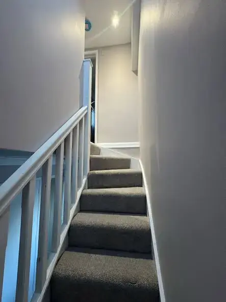 loft conversion specialists surrey with finished staircase access