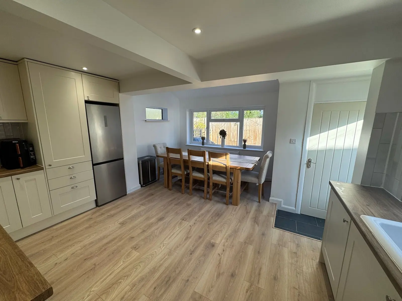 Finished loft conversion with kitchen and dining area in West Byfleet