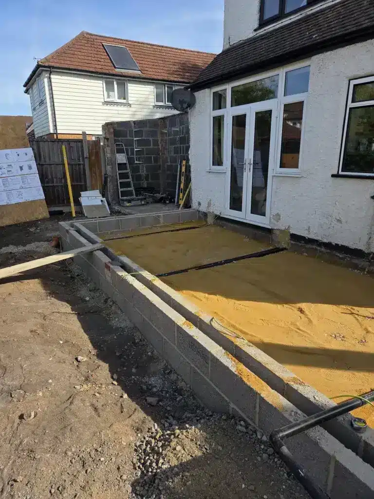 Harpers Home Developments 67 prepared foundation base at the rear of a house extension.