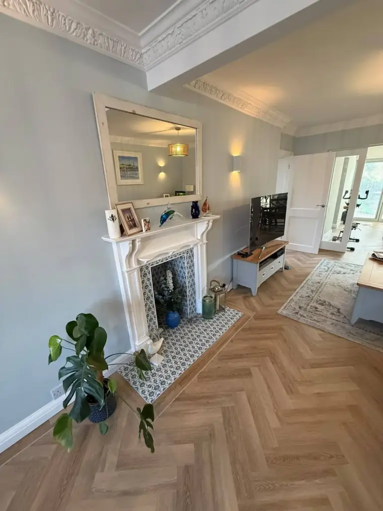 House Extension And Renovation In Shepperton For More Usable Living Space 3 home renovation hallway fireplace herringbone floor