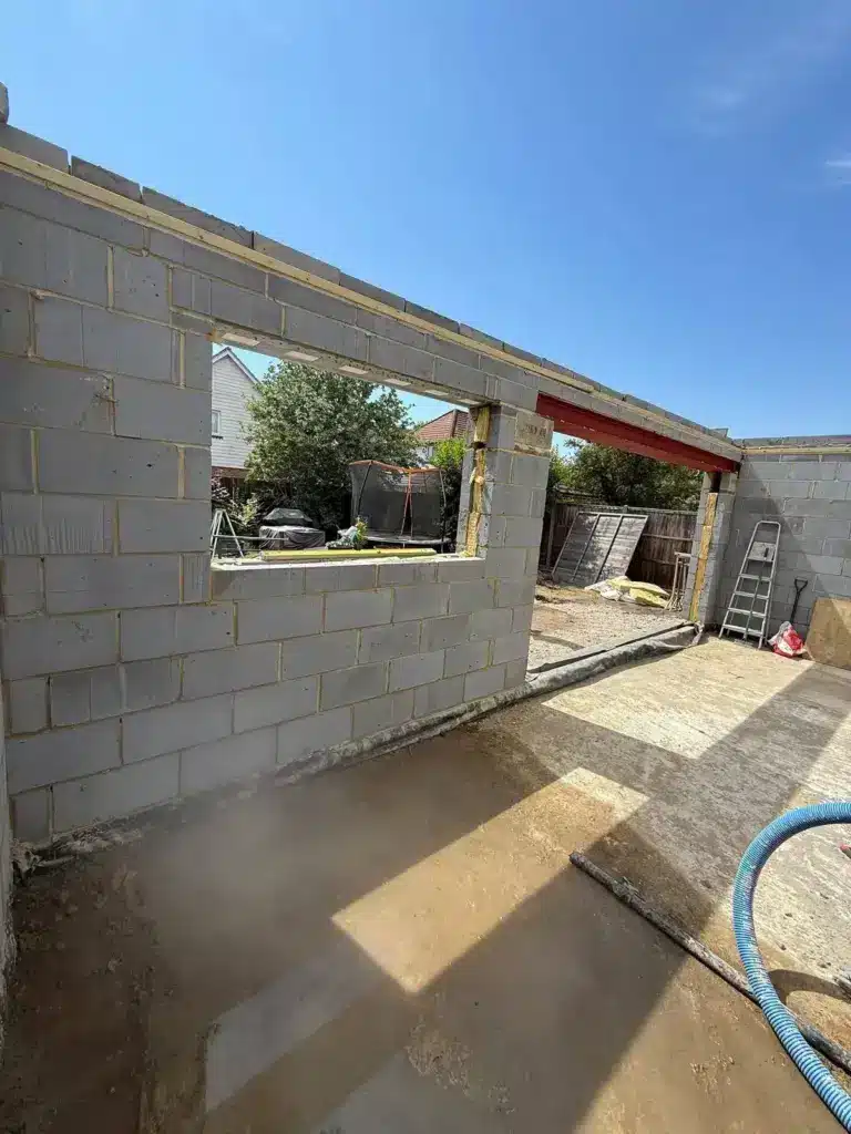 New Extension For A Home In North Surrey Taking Shape From The Ground Up 2 house extension blockwork window opening