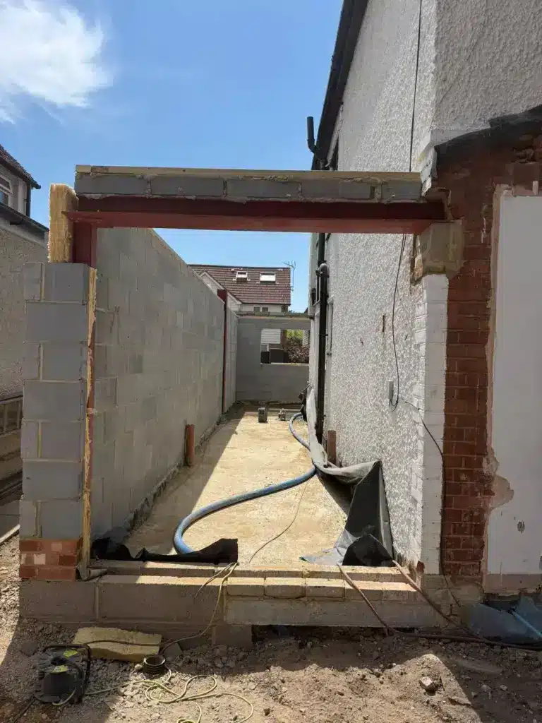 New Extension For A Home In North Surrey Taking Shape From The Ground Up 3 house extension doorway lintel blockwork