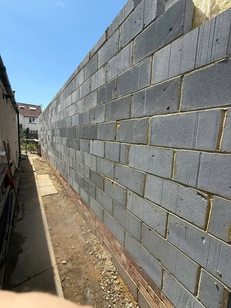 New Extension For A Home In North Surrey Taking Shape From The Ground Up 4 house extension long blockwork side wall