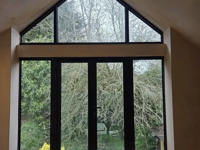 Garage Conversions 7 garage conversion specialists surrey with bright gable window and garden doors