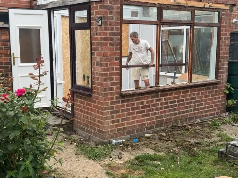 House Extensions 7 house extension builders surrey working on brick rear extension exterior
