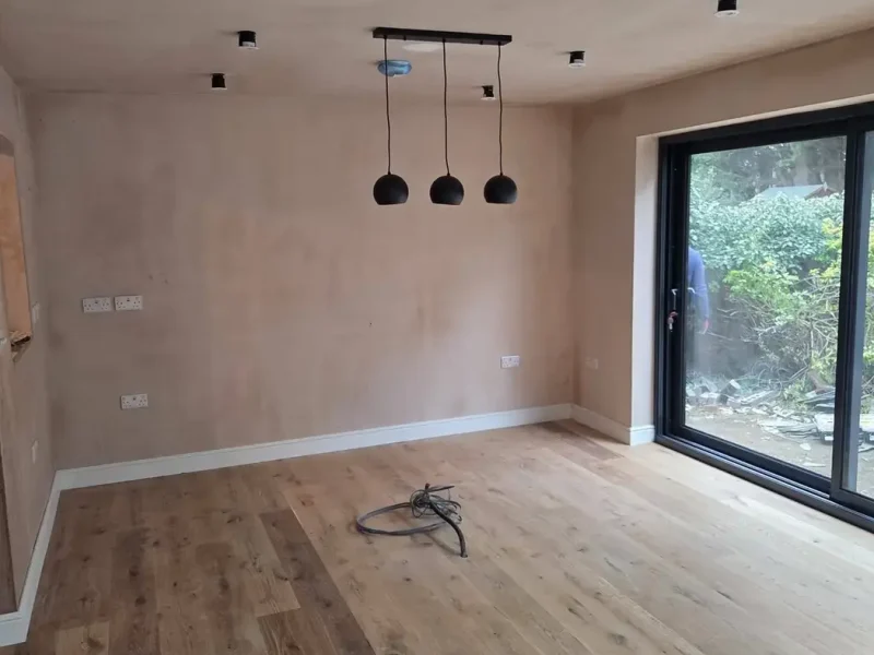 House Extensions 5 house extension builders surrey with open-plan interior and garden doors