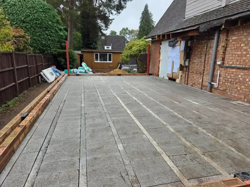 new build contractors surrey preparing concrete base and driveway area