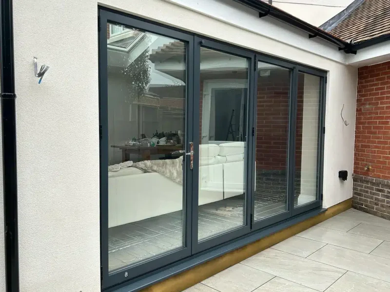 New Builds 7 new build contractors in surrey installing modern sliding glass doors