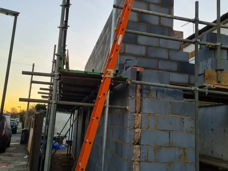 New Roofs 9 new roof installation in surrey with crane, scaffolding and structural roof work