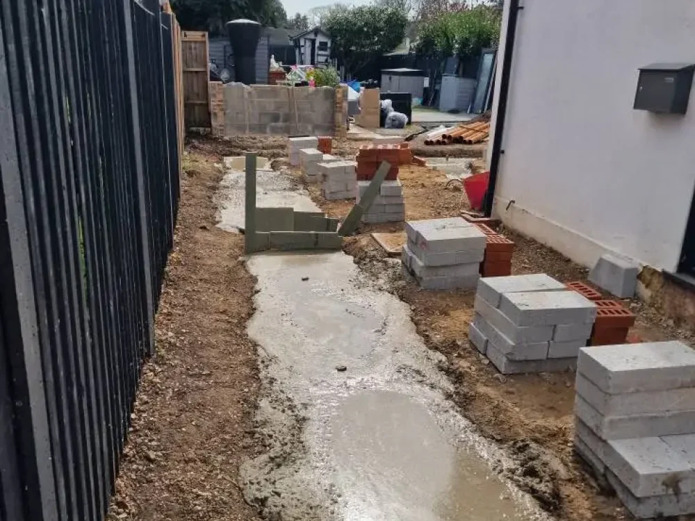 residential-groundworkers-filling-concrete-trenches-groundwork-surrey residential-groundworkers-filling-concrete-trenches-groundwork-surrey